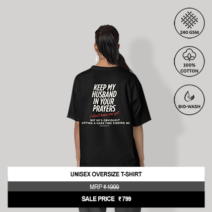 “Keep My Husband in Your Prayers, I Don’t Have One Yet But He’s Obviously Having a Hard Time Finding Me” Unisex Black Oversized Graphic T-Shirt