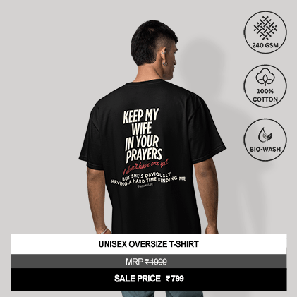 “Keep My Wife in Your Prayers, I Don’t Have One Yet But She’s Obviously Having a Hard Time Finding Me” Unisex Black Oversized Graphic T-Shirt